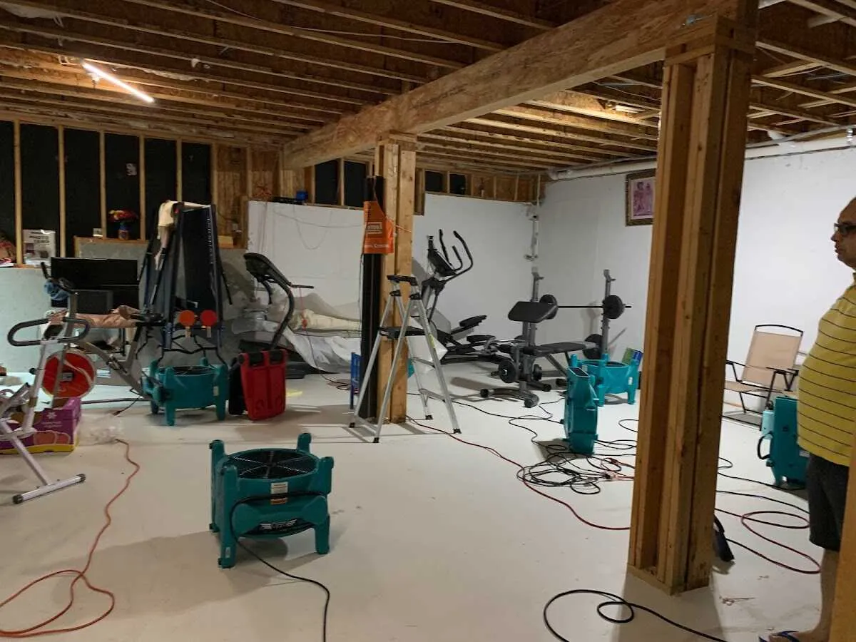 Basement drying equipment setup for Contents Cleaning & Restoration in North Liberty